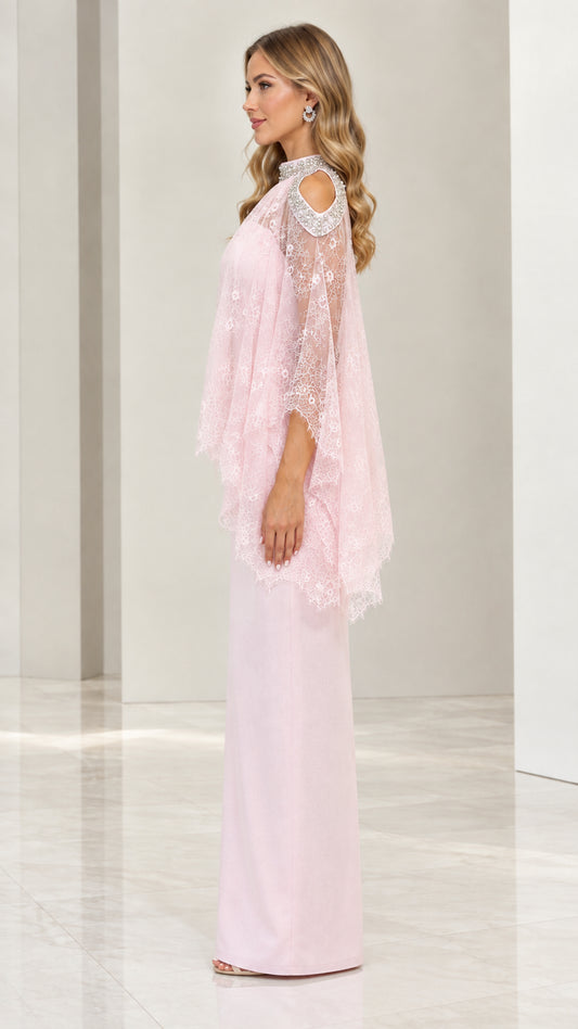 Side profile view of blush pink formal dress with sheer lace poncho overlay