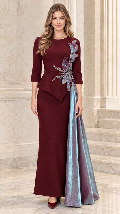 Front view of burgundy wine formal gown with 3/4 sleeves and shimmering side drape